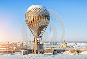 Monument to Jules Verne in a balloon  in Nizhny Novgorod photo